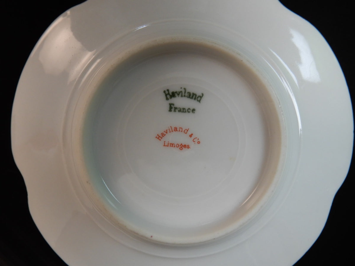 Set of three Haviland Limoges Floral Ramikins and Saucers