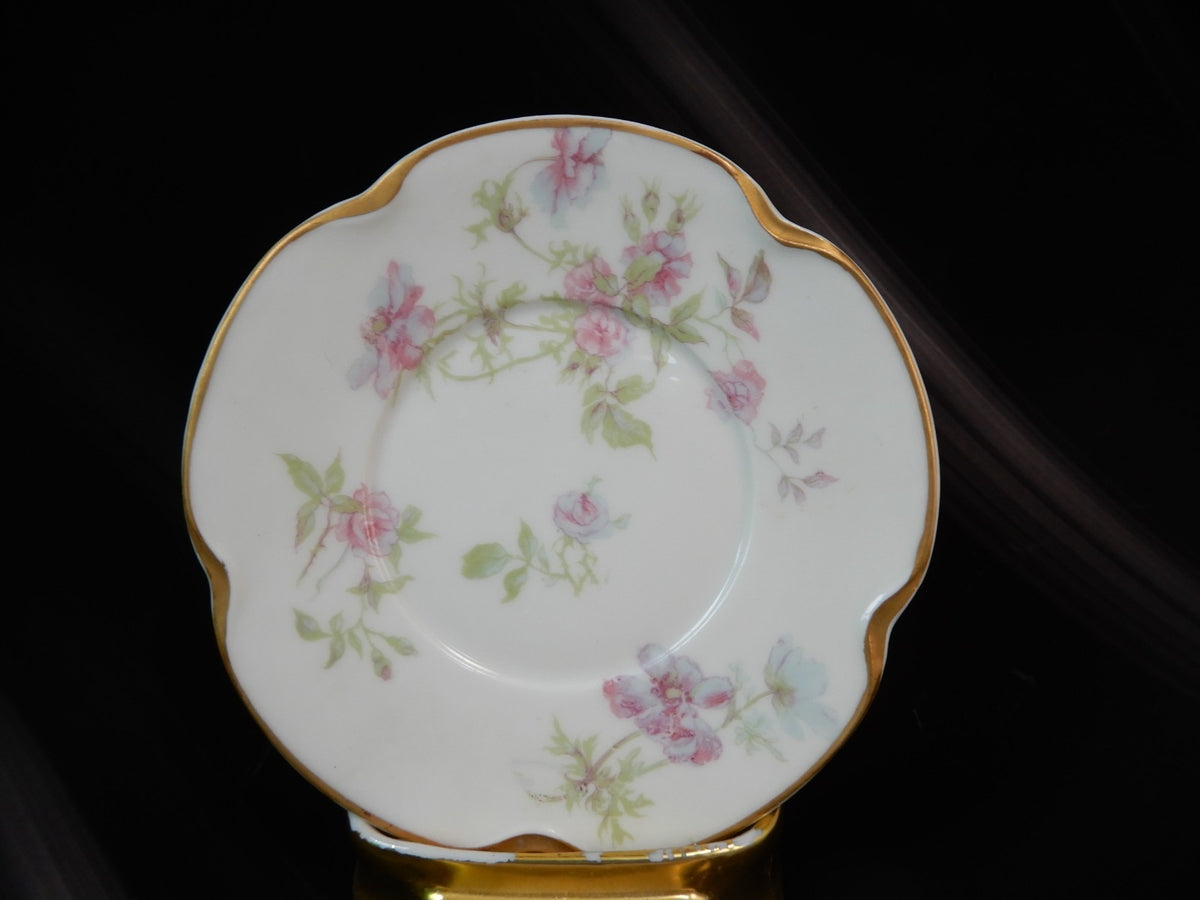 Set of three Haviland Limoges Floral Ramikins and Saucers