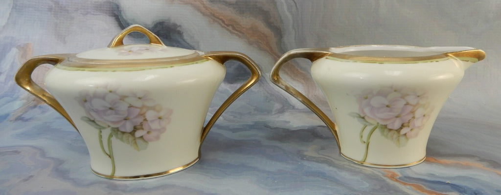 RS Germany Hand Painted Porcelain Sugar Bowl and Creamer Signed By The Artist