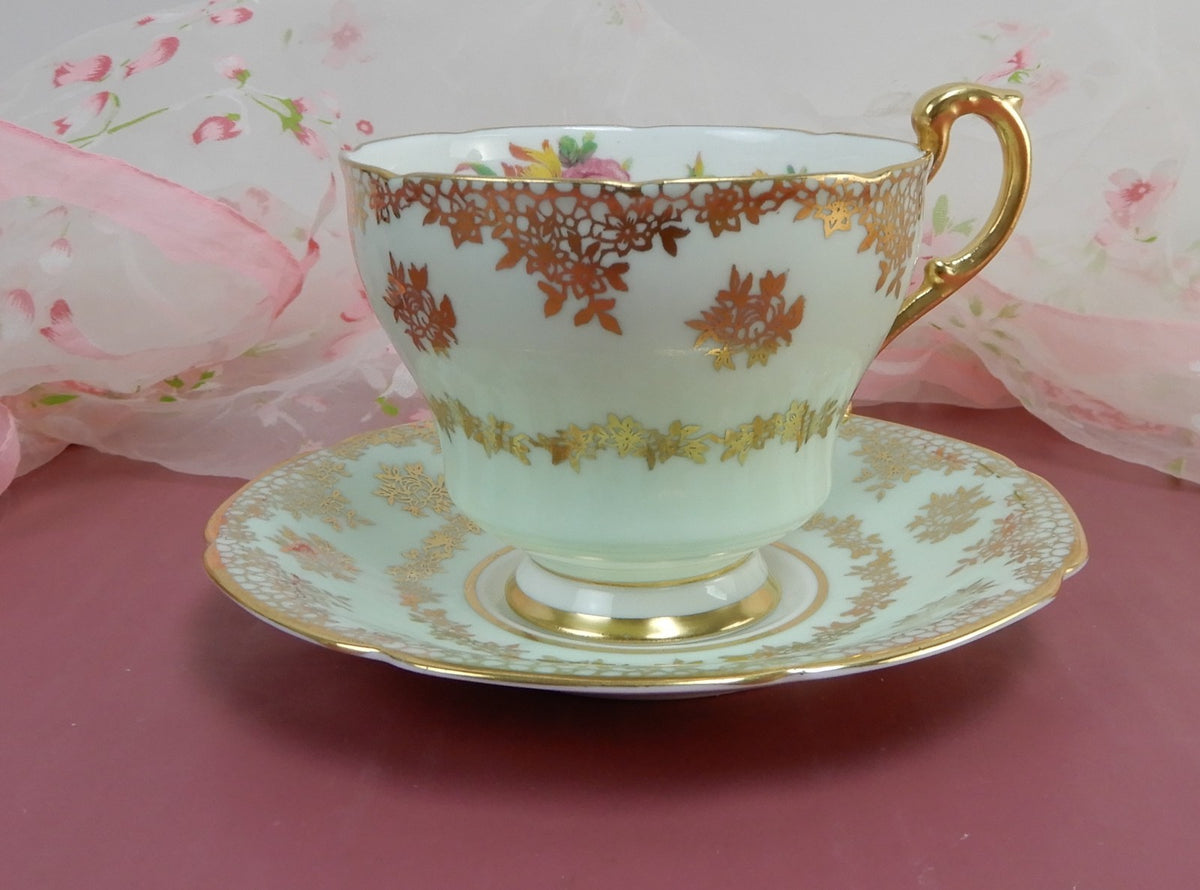 Paragon Double Warrant Mint Green Gold Filigree Tea Cup & Saucer