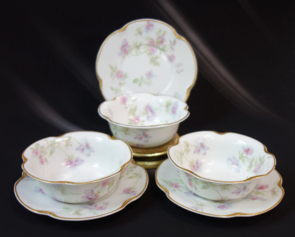 Set of three Haviland Limoges Floral Ramikins and Saucers