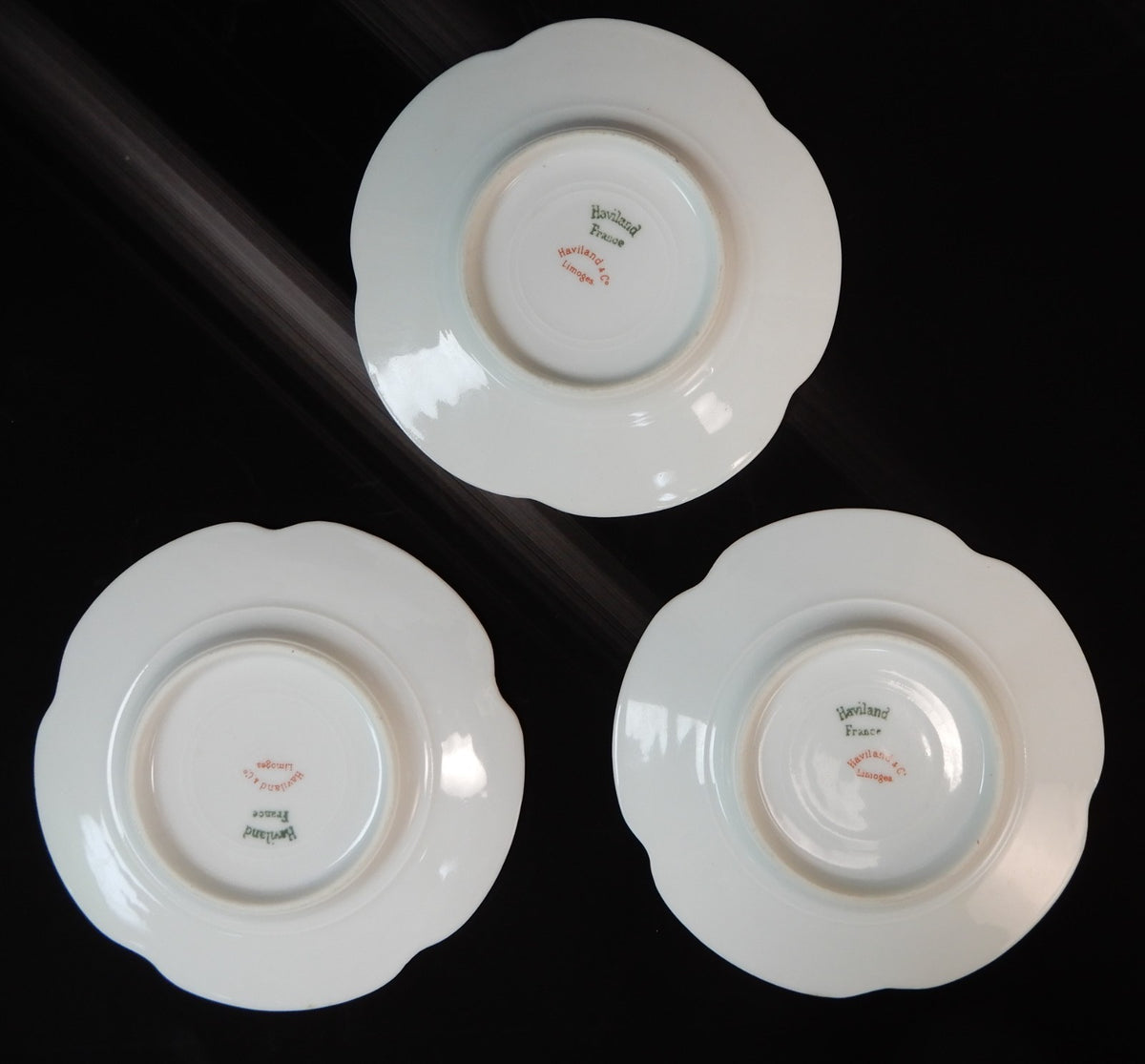 Set of three Haviland Limoges Floral Ramikins and Saucers