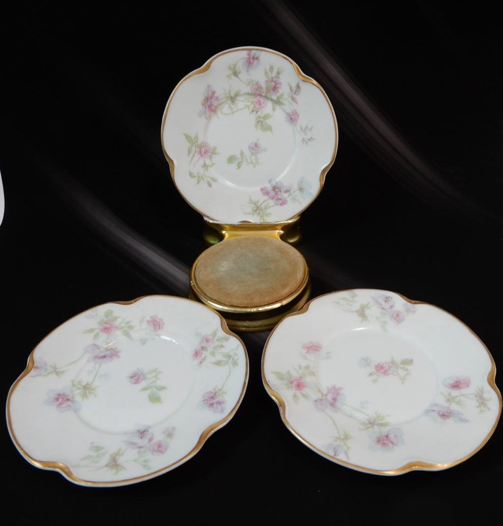 Set of three Haviland Limoges Floral Ramikins and Saucers