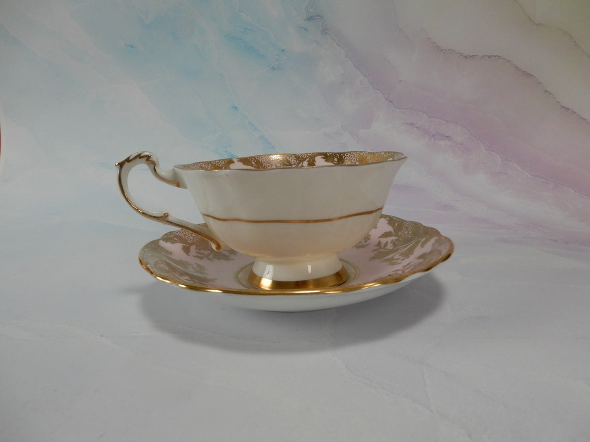 Paragon “ HM The Queen & HM Queen Mary” Light Pink Gold Filigre Cup And Saucer