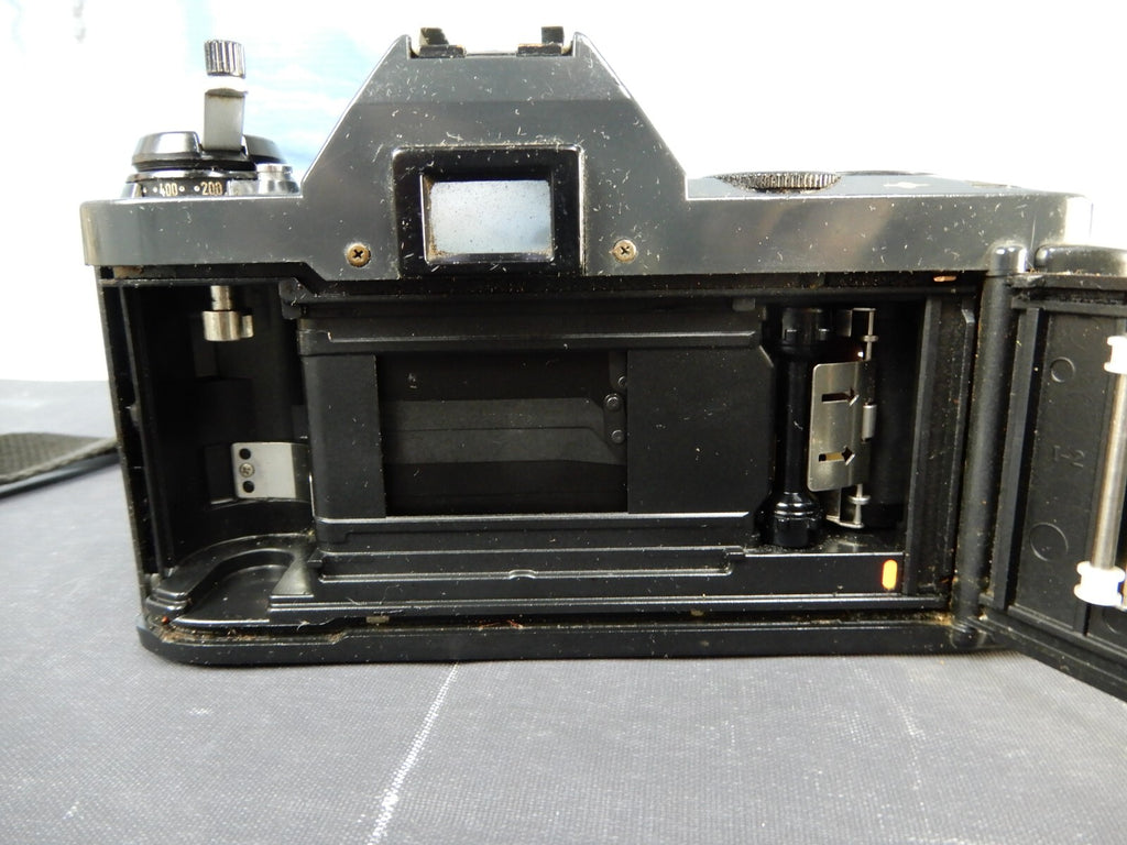 Canon T50 35mm SLR Film Camera FOR PARTS OR REPAIR AS IS