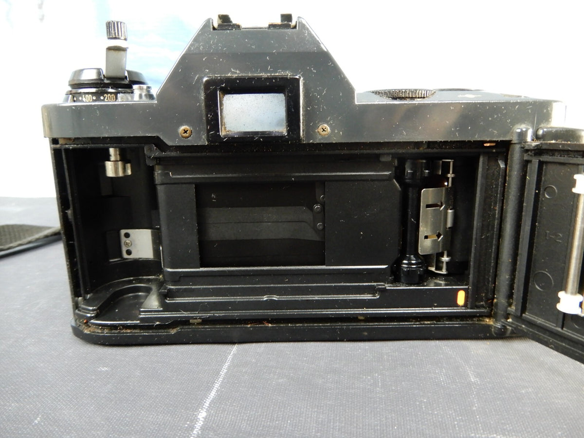 Canon T50 35mm SLR Film Camera FOR PARTS OR REPAIR AS IS