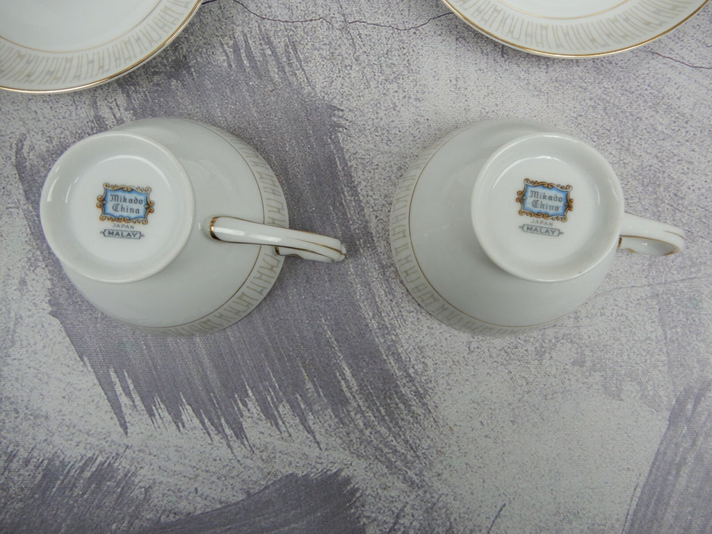 Mikado Malay Gold & Gray Pieces Two Dinner Plates,Two sets of Cups and Saucers