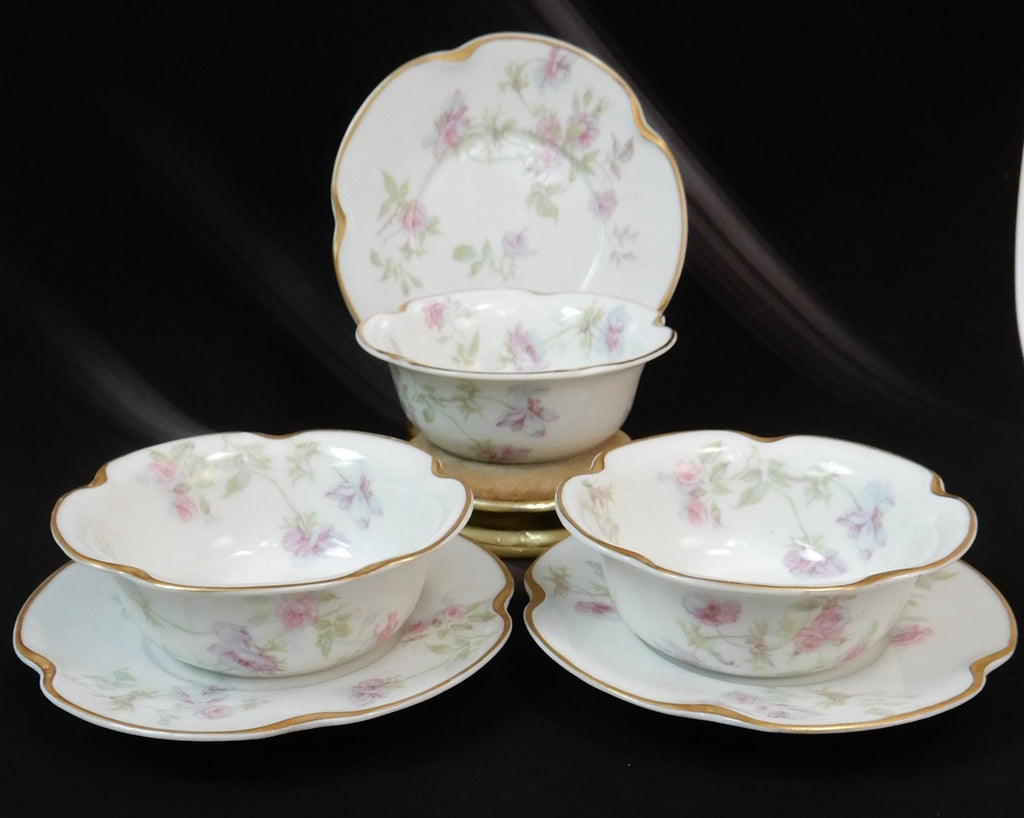 Set of three Haviland Limoges Floral Ramikins and Saucers