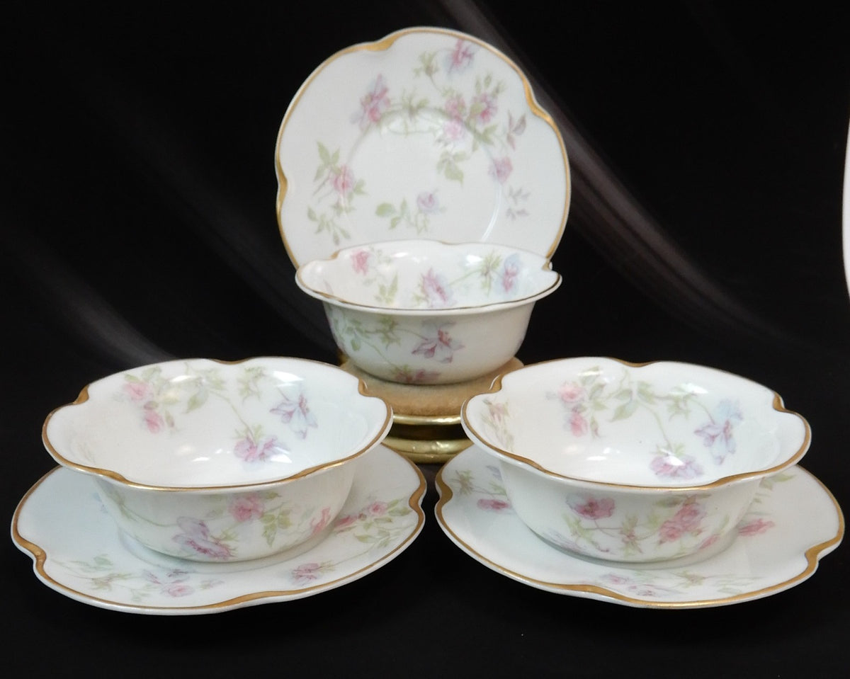 Set of three Haviland Limoges Floral Ramikins and Saucers